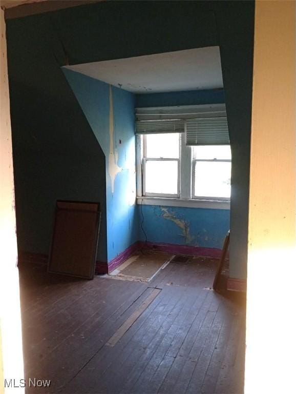 424 Elm St, Martins Ferry, OH 43935 - additional living space with hardwood / wood-style floors and baseboards