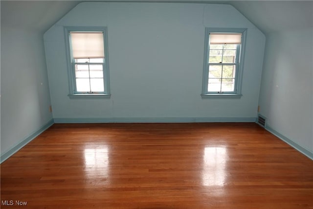 2323 Miramar Blvd, University Heights, OH 44118 - bonus room with vaulted ceiling, wood finished floors, and baseboards