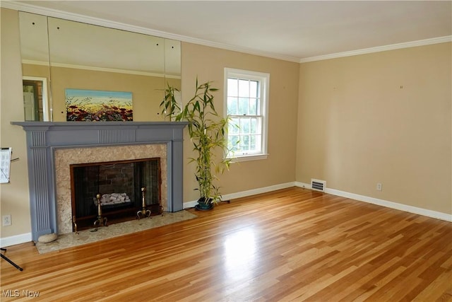 2323 Miramar Blvd, University Heights, OH 44118 - unfurnished living room featuring wood finished floors, ornamental molding, a fireplace, and baseboards