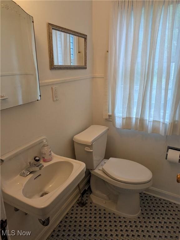 2323 Miramar Blvd, University Heights, OH 44118 - bathroom with toilet and a sink