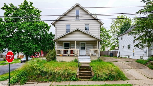 1197 Carey Ave, Akron, OH 44314 - traditional style home featuring a porch and driveway