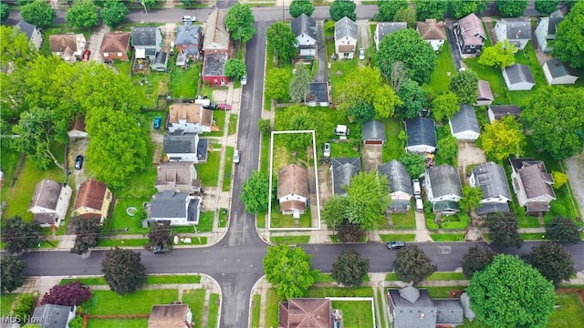 1197 Carey Ave, Akron, OH 44314 - aerial view of property and surrounding area with nearby suburban area and property parcel outlined