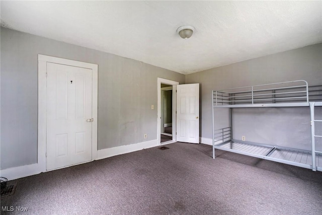 492 W Pershing St, Salem, OH 44460 - unfurnished bedroom with carpet flooring and baseboards