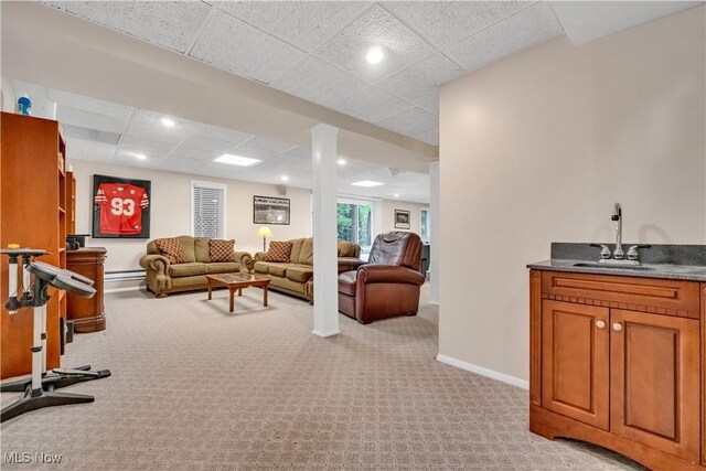 1271 Emerald Creek Dr, Broadview Heights, OH 44147 - living room with light colored carpet, a drop ceiling, baseboards, recessed lighting, and a baseboard heating unit