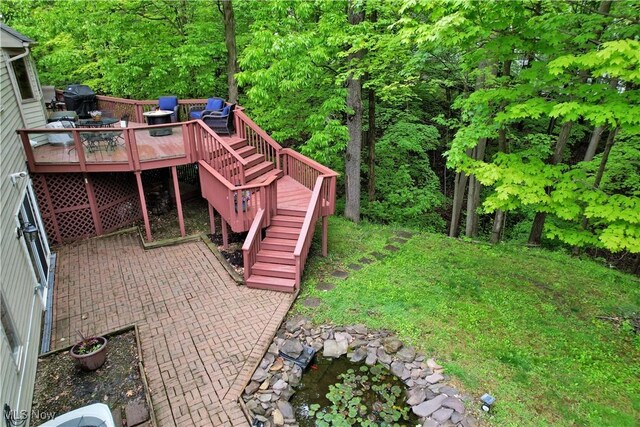 1271 Emerald Creek Dr, Broadview Heights, OH 44147 - view of yard with stairway, a wooden deck, and a patio area