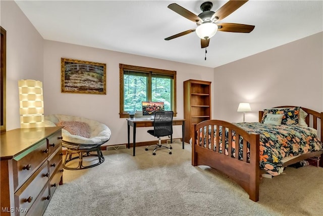 1271 Emerald Creek Dr, Broadview Heights, OH 44147 - carpeted bedroom with an office area, baseboards, and a ceiling fan