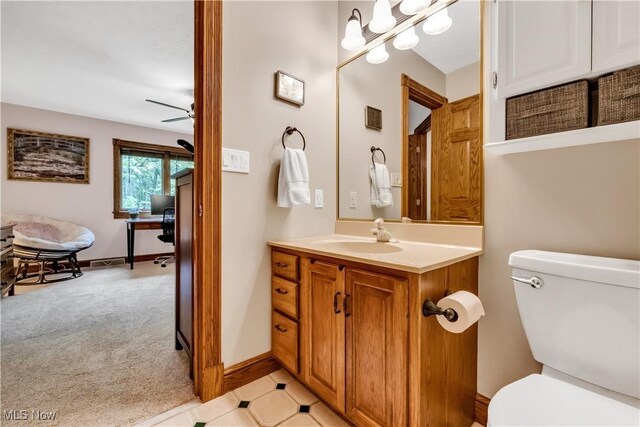 1271 Emerald Creek Dr, Broadview Heights, OH 44147 - half bath with vanity, toilet, baseboards, and a ceiling fan