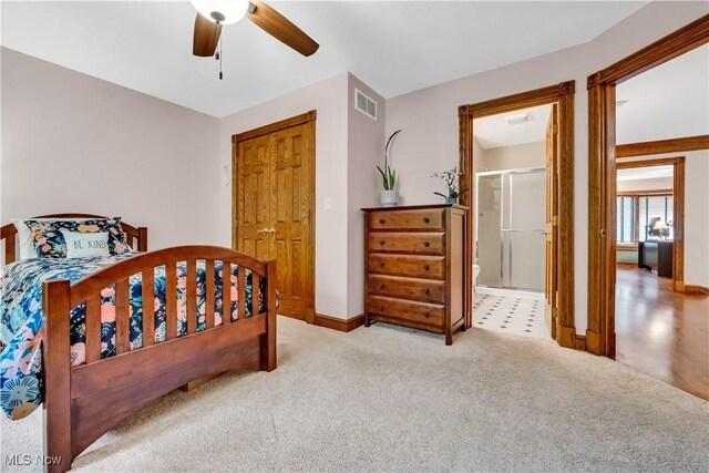 1271 Emerald Creek Dr, Broadview Heights, OH 44147 - bedroom featuring carpet floors, baseboards, a ceiling fan, and connected bathroom