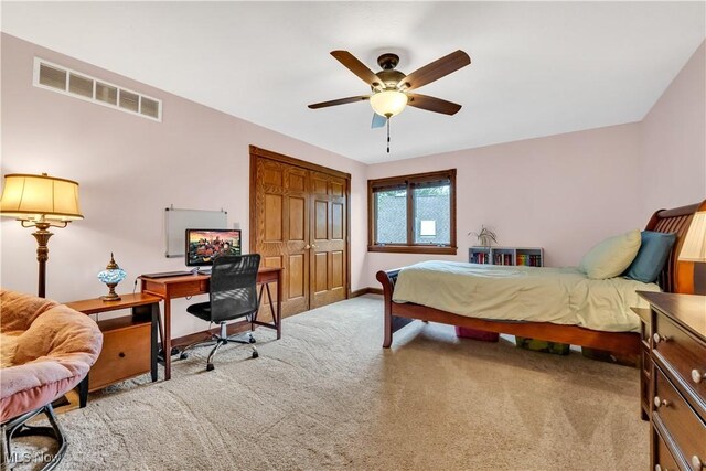 1271 Emerald Creek Dr, Broadview Heights, OH 44147 - bedroom featuring carpet flooring, a closet, a desk, baseboards, and a ceiling fan