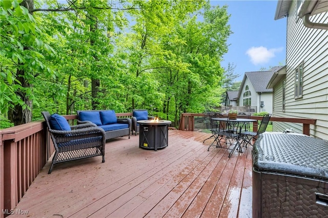 1271 Emerald Creek Dr, Broadview Heights, OH 44147 - wooden terrace featuring outdoor dining space and an outdoor living space with a fire pit