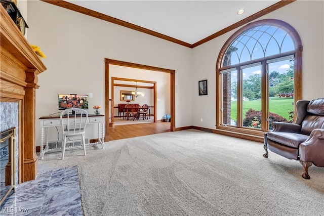 1271 Emerald Creek Dr, Broadview Heights, OH 44147 - living area featuring carpet floors, a chandelier, crown molding, and baseboards