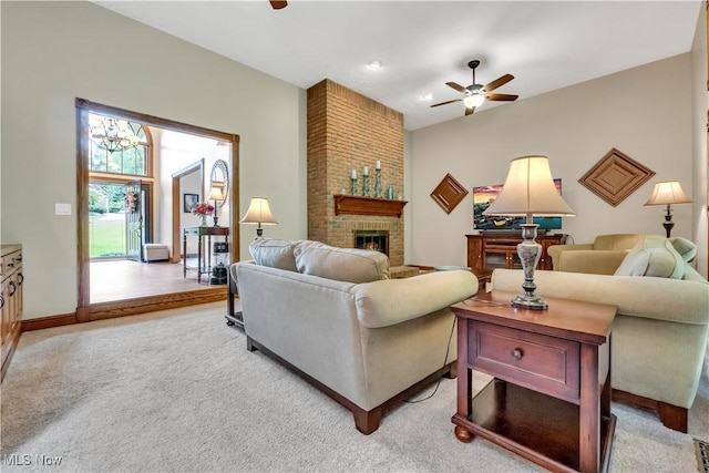 1271 Emerald Creek Dr, Broadview Heights, OH 44147 - living room featuring ceiling fan, a brick fireplace, and light carpet