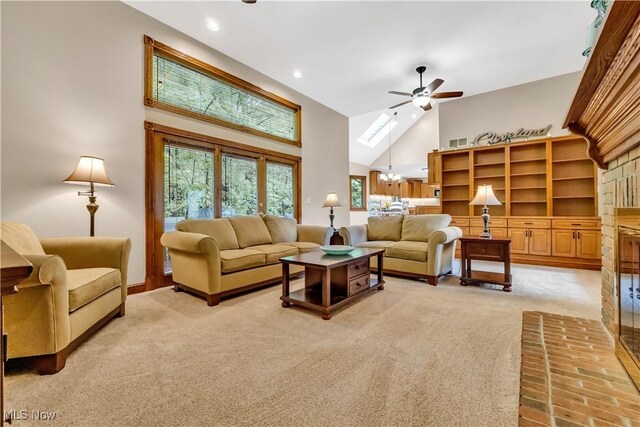 1271 Emerald Creek Dr, Broadview Heights, OH 44147 - living area featuring light colored carpet, a ceiling fan, high vaulted ceiling, a chandelier, and recessed lighting