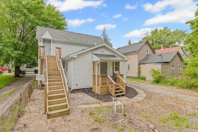 319 Sterling Ct, Akron, OH 44304 - view of front of property featuring stairway and roof with shingles