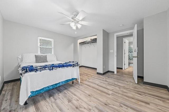 319 Sterling Ct, Akron, OH 44304 - bedroom featuring wood finished floors, a closet, and a ceiling fan
