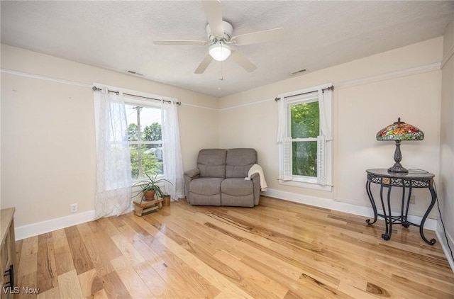 201 E Spring St, Marietta, OH 45750 - sitting room featuring light wood finished floors, a ceiling fan, and baseboards
