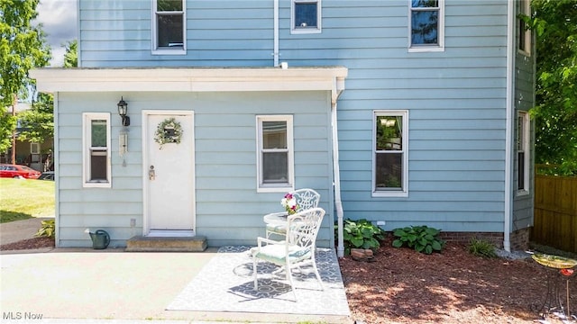 201 E Spring St, Marietta, OH 45750 - rear view of property featuring a patio