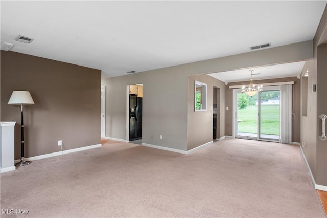 8936 Taylor May Rd, Chagrin Falls, OH 44023 - unfurnished living room featuring a chandelier, baseboards, and light colored carpet