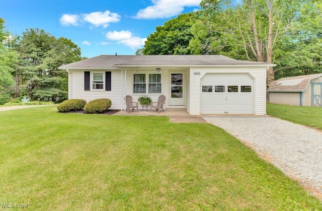 1825 Union Ave SE, Minerva, OH 44657 - ranch-style house with driveway, a front lawn, and a garage