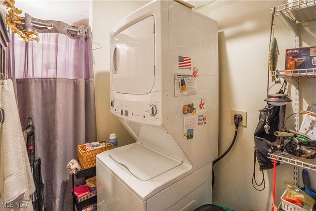3490 Vanderhoof Rd, New Franklin, OH 44203 - washroom with estacked washer and dryer and water heater