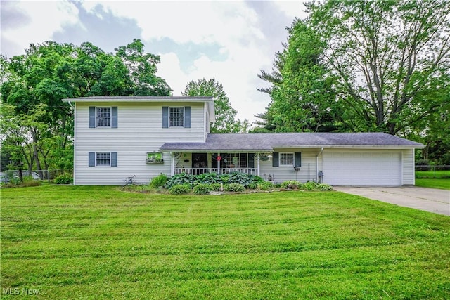 3490 Vanderhoof Rd, New Franklin, OH 44203 - view of front of home featuring a garage, driveway, and covered porch