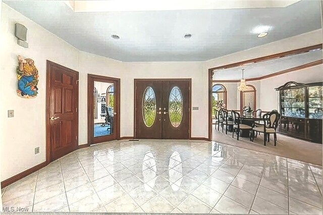 6419 S Rim Cir, Valley City, OH 44280 - foyer with healthy amount of natural light, baseboards, french doors, and recessed lighting