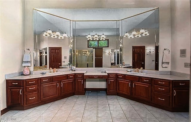 6419 S Rim Cir, Valley City, OH 44280 - bathroom featuring tile patterned floors, vanity, and a shower with door