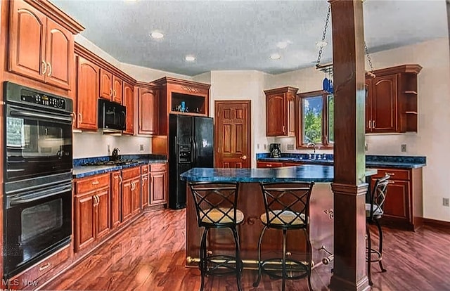 6419 S Rim Cir, Valley City, OH 44280 - kitchen with open shelves, black appliances, dark wood-style flooring, dark countertops, and a textured ceiling