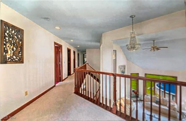 6419 S Rim Cir, Valley City, OH 44280 - hall featuring an upstairs landing, carpet flooring, baseboards, a chandelier, and recessed lighting