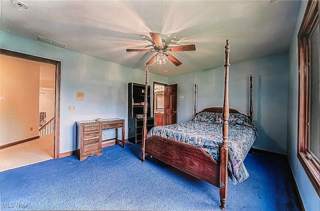 6419 S Rim Cir, Valley City, OH 44280 - bedroom featuring carpet, a ceiling fan, a textured ceiling, and baseboards