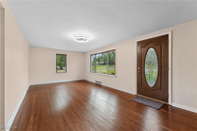 6525 Wales Ave NW, Massillon, OH 44646 - foyer entrance featuring wood finished floors and baseboards