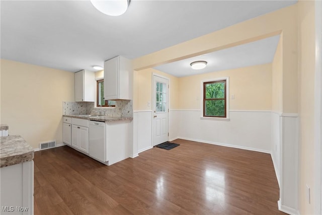 6525 Wales Ave NW, Massillon, OH 44646 - kitchen with white dishwasher, dark wood finished floors, and white cabinets