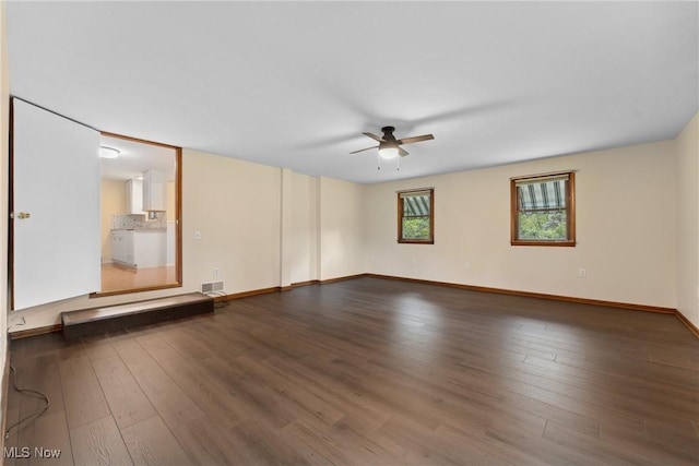 6525 Wales Ave NW, Massillon, OH 44646 - spare room with ceiling fan, wood finished floors, and baseboards
