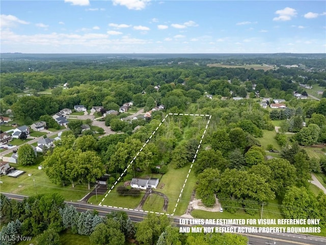 6525 Wales Ave NW, Massillon, OH 44646 - aerial overview of property's location featuring property boundaries highlighted and a heavily wooded area