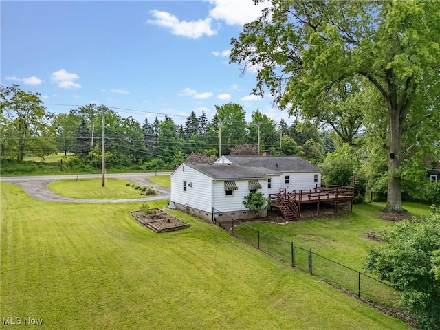 6525 Wales Ave NW, Massillon, OH 44646 - back of house featuring a deck, stairs, a garden, dirt driveway, and crawl space