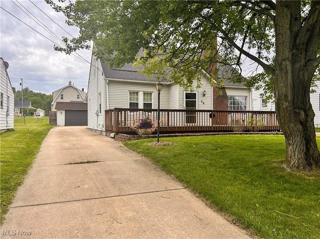 76 Parkgate Ave, Youngstown, OH 44515 - view of front of property featuring a wooden deck, a front lawn, and an outbuilding