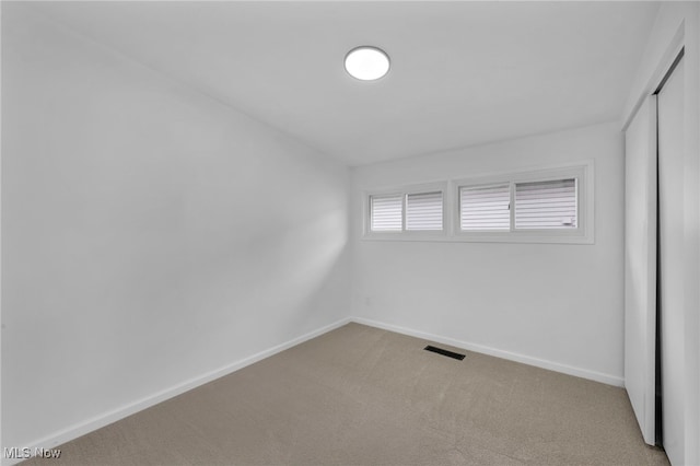 6482 Sherborn Rd, Parma Heights, OH 44130 - unfurnished bedroom with a closet, baseboards, and carpet flooring