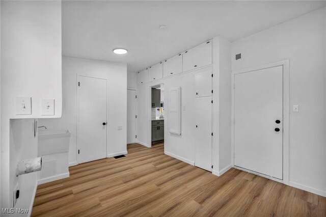 6482 Sherborn Rd, Parma Heights, OH 44130 - unfurnished bedroom featuring light wood-style flooring and baseboards