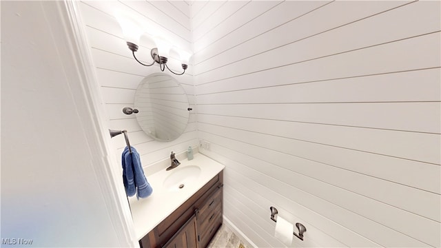 3130 Hollybrook Ln, Mogadore, OH 44260 - bathroom featuring vanity and wood walls