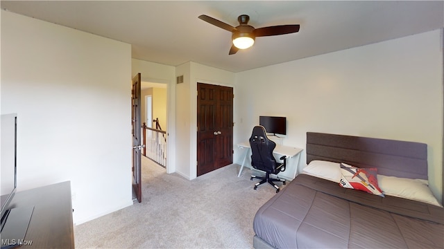 3130 Hollybrook Ln, Mogadore, OH 44260 - carpeted bedroom featuring ceiling fan, baseboards, and a desk