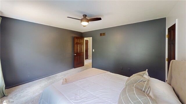 3130 Hollybrook Ln, Mogadore, OH 44260 - carpeted bedroom featuring a ceiling fan