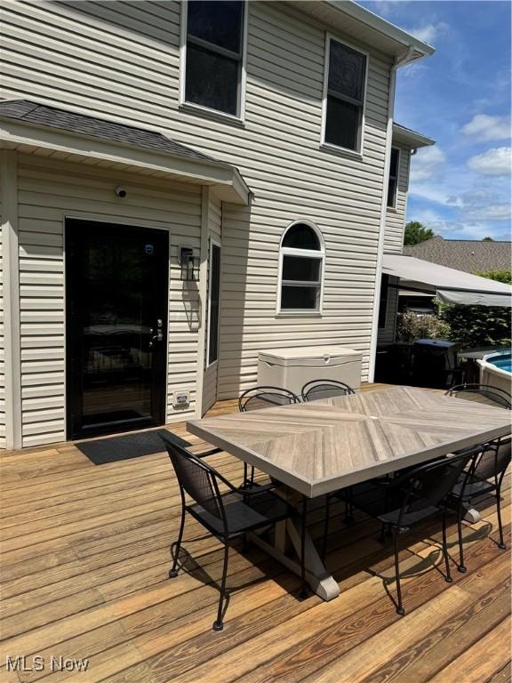3130 Hollybrook Ln, Mogadore, OH 44260 - wooden terrace with outdoor dining area