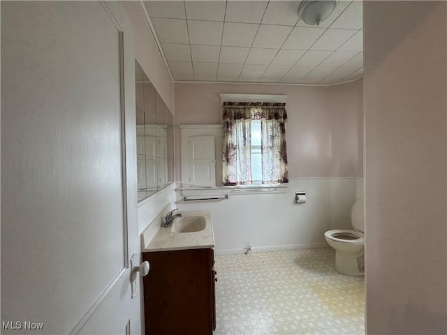 1733 E 47th St, Ashtabula, OH 44004 - bathroom with toilet, tile patterned floors, and vanity