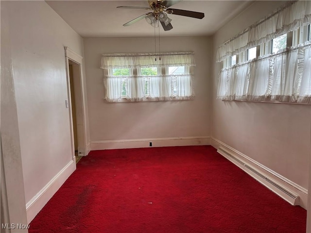1733 E 47th St, Ashtabula, OH 44004 - carpeted empty room featuring baseboard heating, ceiling fan, and baseboards