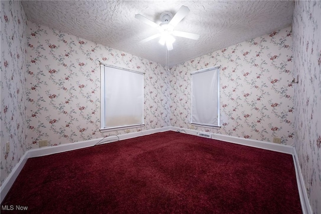 113 Lincoln Ct, Elyria, OH 44035 - carpeted empty room with a textured ceiling, a ceiling fan, and baseboards
