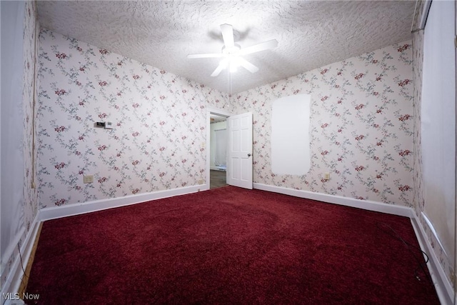 113 Lincoln Ct, Elyria, OH 44035 - spare room featuring a textured ceiling, a ceiling fan, carpet, wallpapered walls, and baseboards