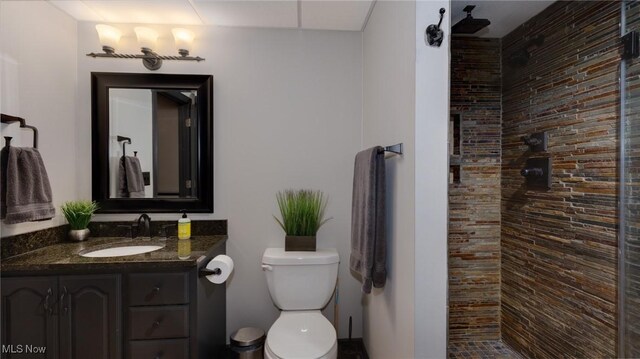 284 Kaylee Dr, Wadsworth, OH 44281 - bathroom featuring vanity, a tile shower, and toilet