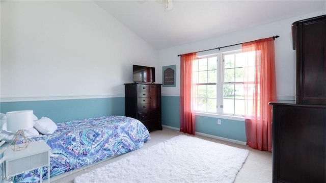284 Kaylee Dr, Wadsworth, OH 44281 - bedroom featuring light carpet, vaulted ceiling, and baseboards