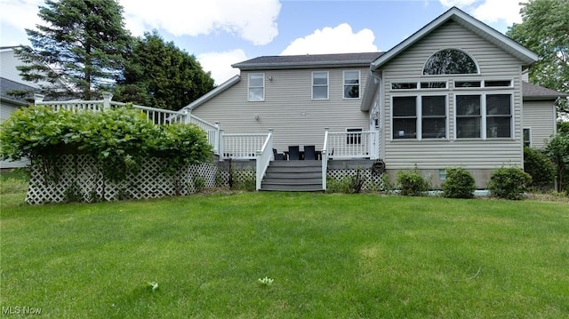 284 Kaylee Dr, Wadsworth, OH 44281 - rear view of property with a lawn, a deck, and stairs