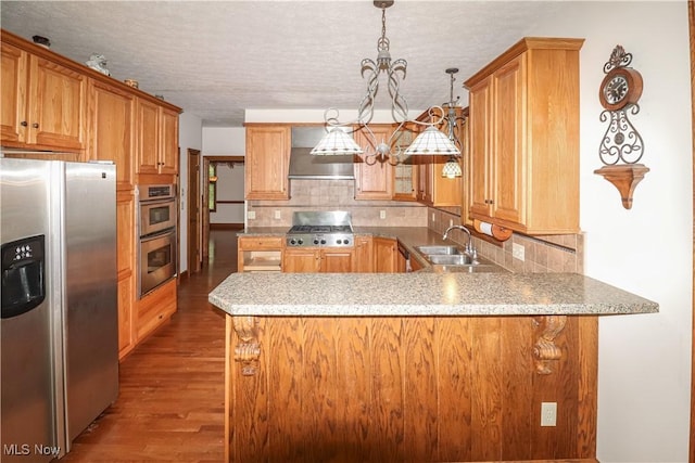 5280 Kapok Dr, Medina, OH 44256 - kitchen featuring appliances with stainless steel finishes, a sink, range hood, tasteful backsplash, and a textured ceiling